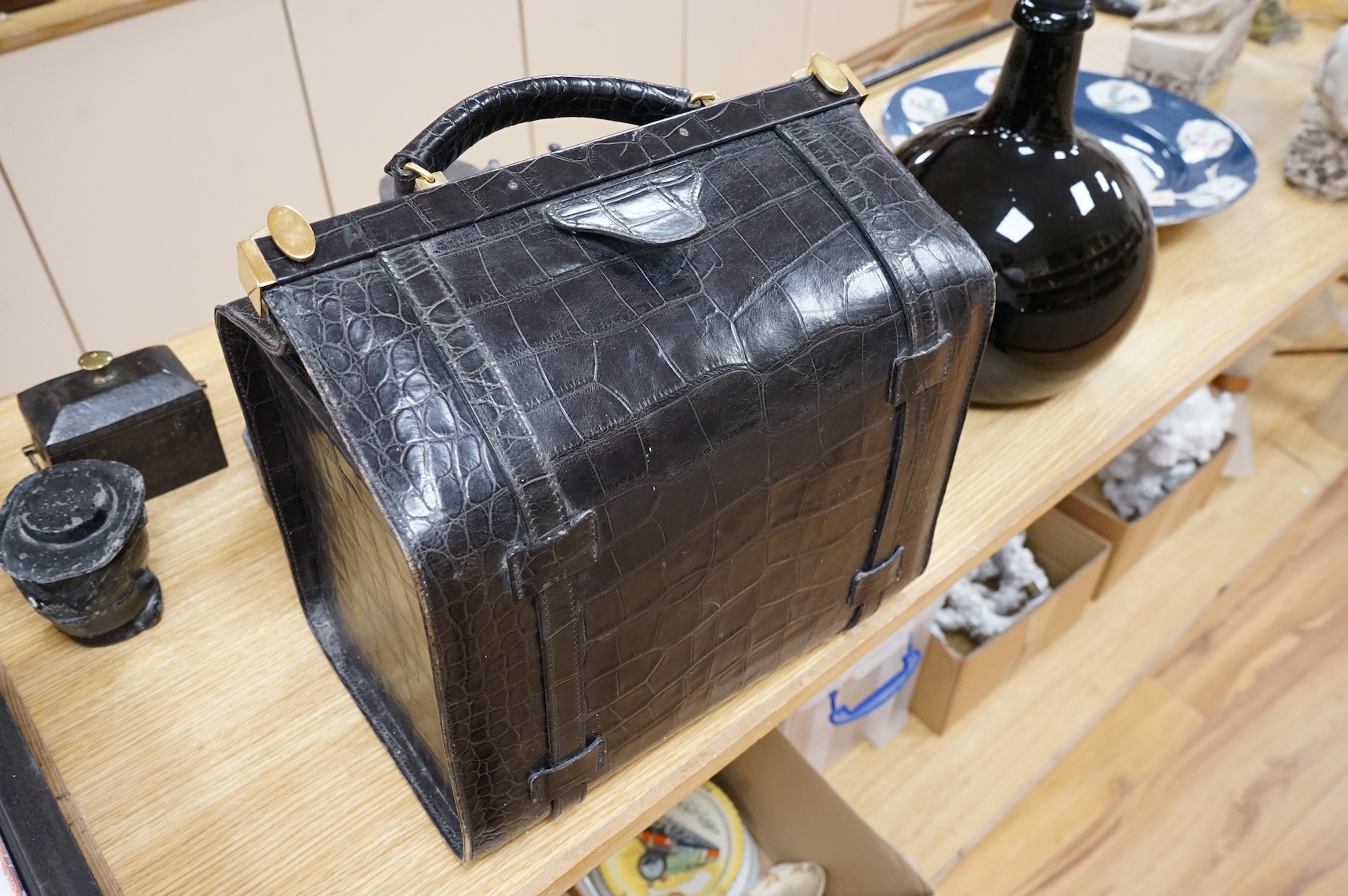 A 1940’s ladies crocodile skin Gladstone bag with gilt metal hardware, 34cm wide